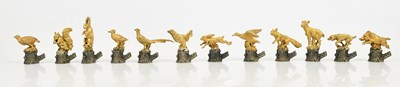Lot 2049 - A set of twelve Italian white and yellow metal...