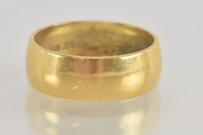 Lot 1234 - A 22ct gold wide band ring, size S, approx 8.5g.
