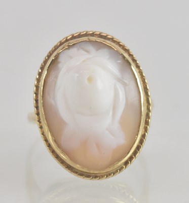 Lot 1315 - A 9ct gold cameo ring, with rose floral cut...