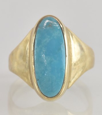 Lot 1272 - A 9ct gold contemporary ring with a bezel set...