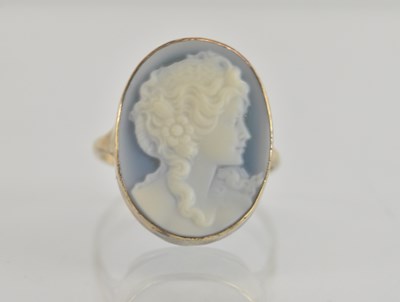 Lot 1347 - A 9ct gold ring, with bezel set cameo of an...