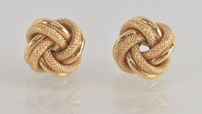 Lot 1456 - A pair of 9ct gold knot stud earrings with...