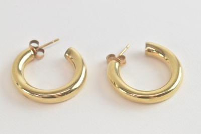 Lot 1457 - A pair of 9ct gold open hoop earrings,...