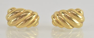 Lot 1446 - A pair of 9ct gold scroll clip-on earrings,...