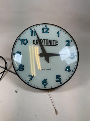 Lot 658 - A vintage electric wall clock inscribed...