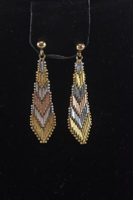 Lot 1445 - A pair of yellow, white and rose metal drop...