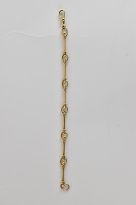 Lot 1512 - A 9ct gold oval and bar link bracelet with...