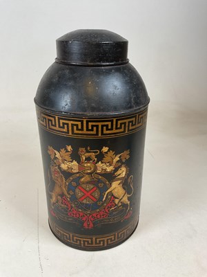 Lot 54 - A toleware japanned tea canister with armorial...