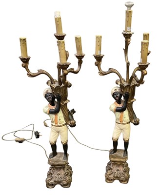 Lot 97 - A pair of reproduction painted wood Blackamoor...