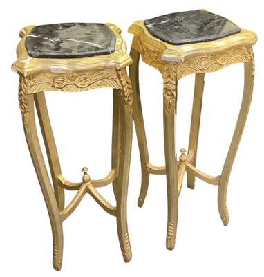 Lot 56 - A pair of reproduction giltwood black marble...