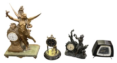 Lot 117 - Four modern decorative timepieces, including...