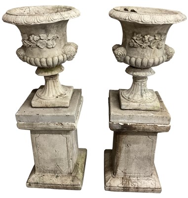 Lot 106 - A pair of modern reconstituted stone garden...