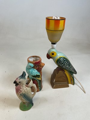 Lot 301 - A parrot decorated vase, a jug, and a parrot...