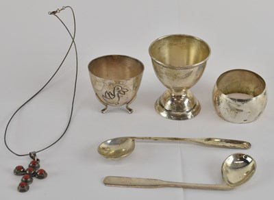 Lot 1098 - An 830 grade silver egg cup, an 830 silver egg...