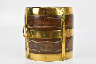 Lot 1508 - An Indian brass bound bucket with two loop...