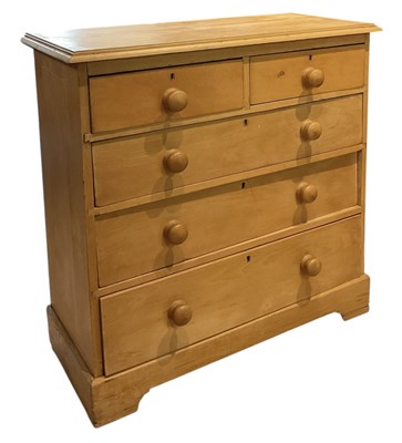 Lot 42 - A modern pine chest of two short over three...