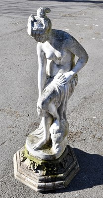 Lot 2689 - A reconstituted stone garden figure of a...