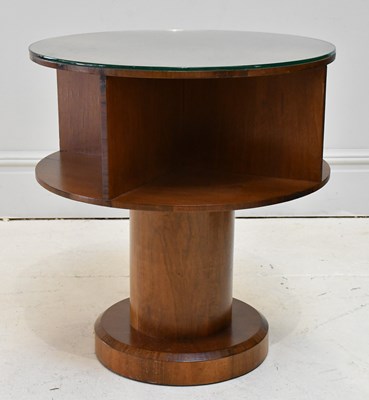 Lot 10 - An Art Deco walnut open circular book case,...