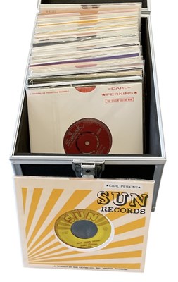 Lot 371 - CARL PERKINS; a case of over forty 45rpm...