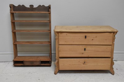 Lot 1031 - An old French pine chest of three drawers,...