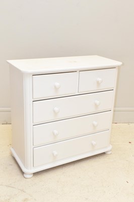 Lot 1054 - A white painted pine chest of two short over...