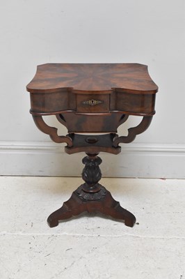 Lot 1111 - A 19th century mahogany breakfront sewing...