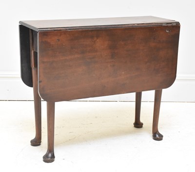 Lot 1169 - A Georgian mahogany drop-leaf supper table of...