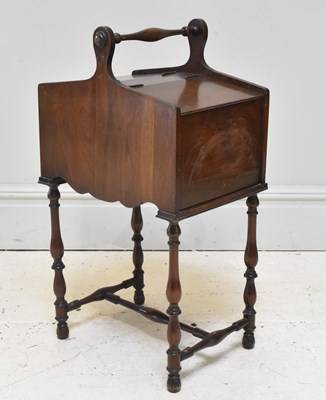 Lot 1162 - A late Victorian walnut portable sewing table,...
