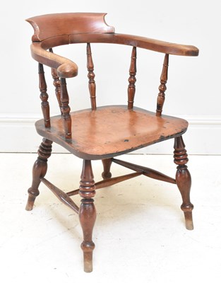 Lot 1126 - A 19th century elm seated smoker's bow back...