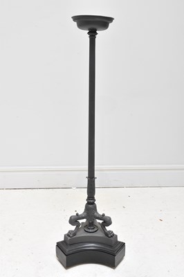 Lot 79 - A modern black painted lamp, height 141cm.