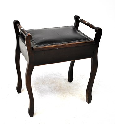 Lot 74 - An early 20th century dark stained piano stool...