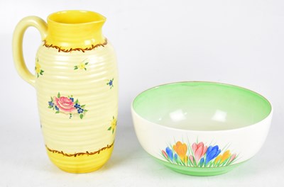 Lot 371 - CLARICE CLIFF; a ribbed jug decorated in the Pompadour pattern