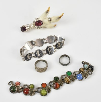 Lot 135 - A Thai sterling silver and niello bracelet,...
