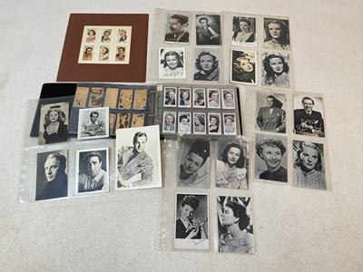 Lot 139 - A book of cigarette cards and photo album of...