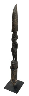 Lot 656 - An African Yoruba Ogo Elegba carved wooden...