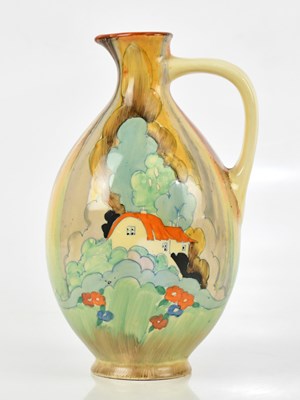Lot 56 - CLARICE CLIFF; a baluster shaped jug decorated...