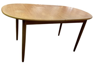 Lot 59 - MEREDEW; a teak mid century extending oval...