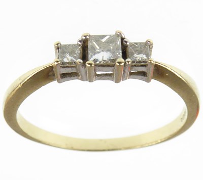 Lot 1054 - A 9ct Art Deco ring set with three claw set...