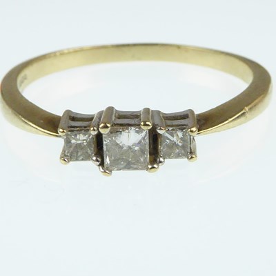 Lot 1054 - A 9ct Art Deco ring set with three claw set...