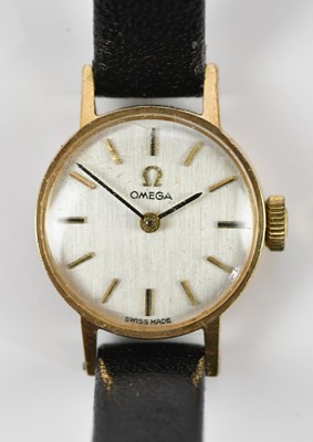 Lot 601 - OMEGA; a lady's 9ct gold cased wristwatch, the...