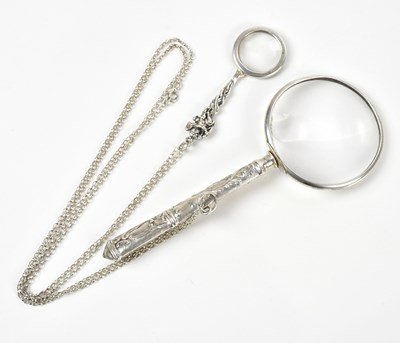 Lot 2133 - A sterling silver magnifying glass, the arm...