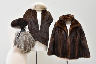 Lot 697 - A short lined brown mink jacket, with large...