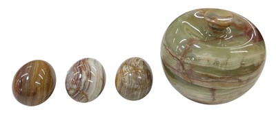 Lot 320 - An onyx carved hardstone lidded pot, height...
