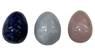 Lot 326 - Three carved hardstone eggs comprising blue...