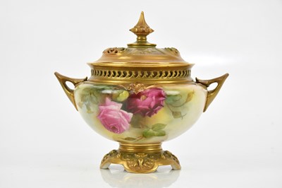 Lot 1651 - ROYAL WORCESTER; a hand painted twin handled...