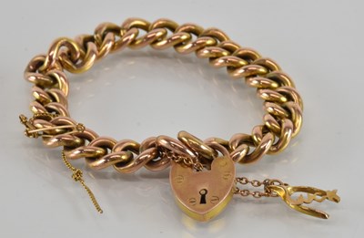 Lot 1500 - A 9ct rose gold bracelet, with 9ct heart...