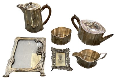 Lot 418 - An early 20th century silver plated four piece...