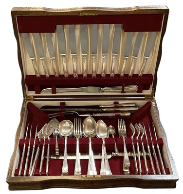 Lot 412 - An early 20th century six setting oak cased...