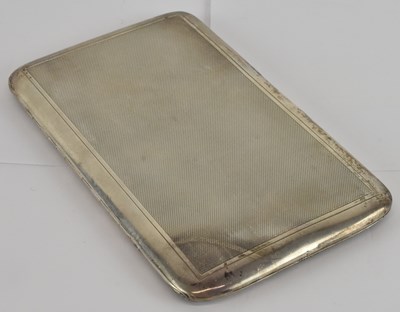 Lot 428 - A George V hallmarked silver cigarette case,...