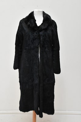 Lot 714 - A full length black vintage coney rabbit fur...